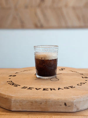 Close up of Non-Alcoholic Espresso Martini made with Kvas Old Fashioned Simple Syrup