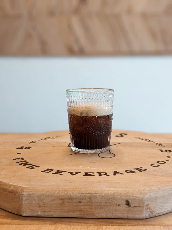 Close up of Non-Alcoholic Espresso Martini made with Kvas Old Fashioned Simple Syrup