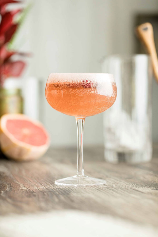 Close up of A Little Thanks cocktail made with Kvas Cranberry Rosemary Simple Syrup