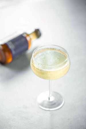 Close up shot of a Lavender Empress cocktail made with Kvas Lavender Jasmine Simple Syrup