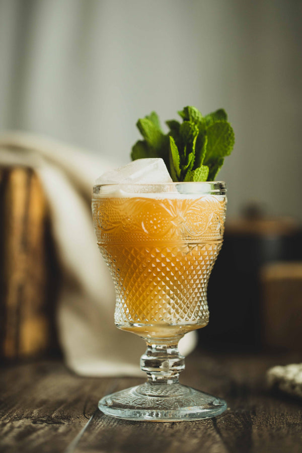 Close up shot of a well made and garnished "Walk on the Wild Rye" cocktail