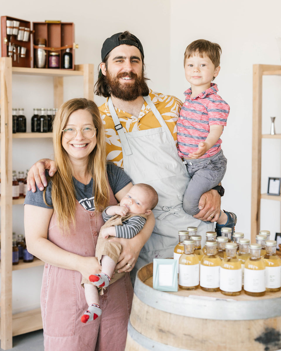 Kvas family smiling in store setting