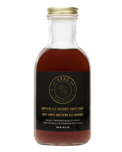 Closeup of Kvas Northern Maple Old Fashioned Simple Syrup bottle on transparent background