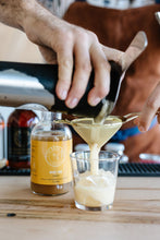Load image into Gallery viewer, Bartender making Whisky Sour cocktail using Kvas Whisky Sour Syrup